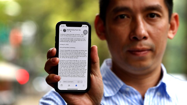 In Vietnam, about half of adults say social media are at least somewhat important for keeping up with political news and other developments. Above, Vietnamese activist La Viet Dung has alleged Facebook may be helping to suppress online dissent. (AFP/Getty Images)