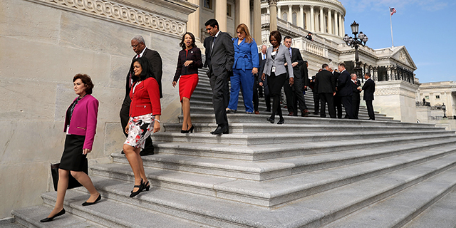 Incoming members of Congress walk down the steps of the House of Representatives after posing for a group photograph Nov. 15, 2016. (Chip Somodevilla/Getty Images)