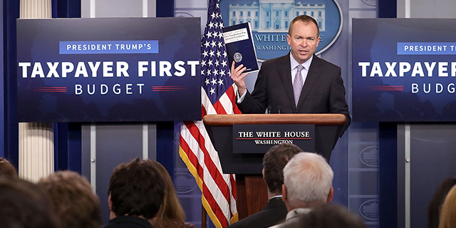 Office of Management and Budget Director Mick Mulvaney discusses the Trump administration's proposed federal budget for fiscal 2018 at a news conference Tuesday. (Chip Somodevilla/Getty Images)