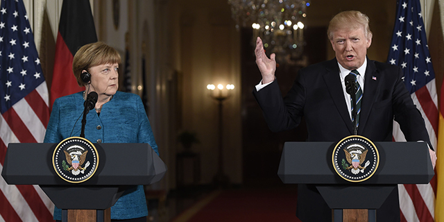 U.S. President Donald Trump and German Chancellor Angela Merkel hold a joint press conference in the East Room of the White House on March 17, 2017. (Saul Loeb/AFP/Getty Images)