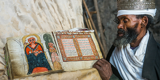 An Orthodox priest at Nakuto Lab Rock Church, outside Lalibela, Ethiopia. About three-quarters of Orthodox Ethiopians say they attend church every week. (Eric Lafforgue/Art in All of Us/Corbis via Getty Images)