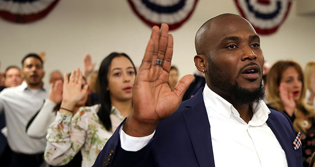 Youdelyn Momperemier, originally from Haiti, becomes an American citizen during a U.S. Citizenship and Immigration Services naturalization ceremony in Hialeah, Florida, on Jan. 12. (Joe Raedle/Getty Images)