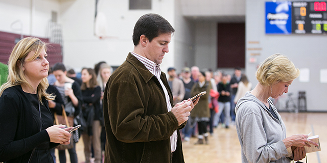 Early morning voters wait to cast their ballots on Election Day. (Jessica McGowan/Getty Images)