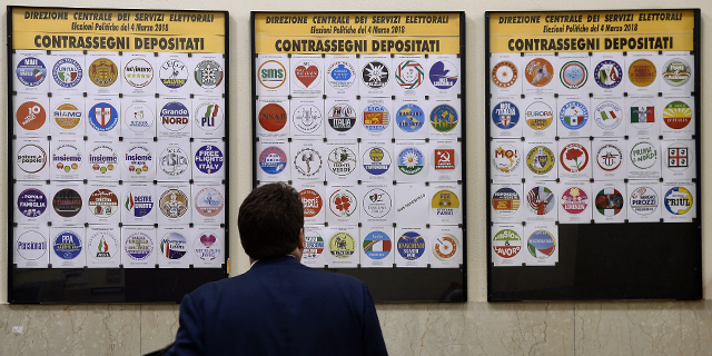 Party logos on display at Italy's Interior Ministry ahead of the March 4 general elections. (Filippo Monteforte/AFP/Getty Images)