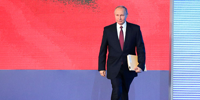 Russian President Vladimir Putin prepares to address the Federal Assembly of the Russian Federation on March 1 at Moscow's Manezh Central Exhibition Hall. (Mikhail Klimentyev/TASS via Getty Images)