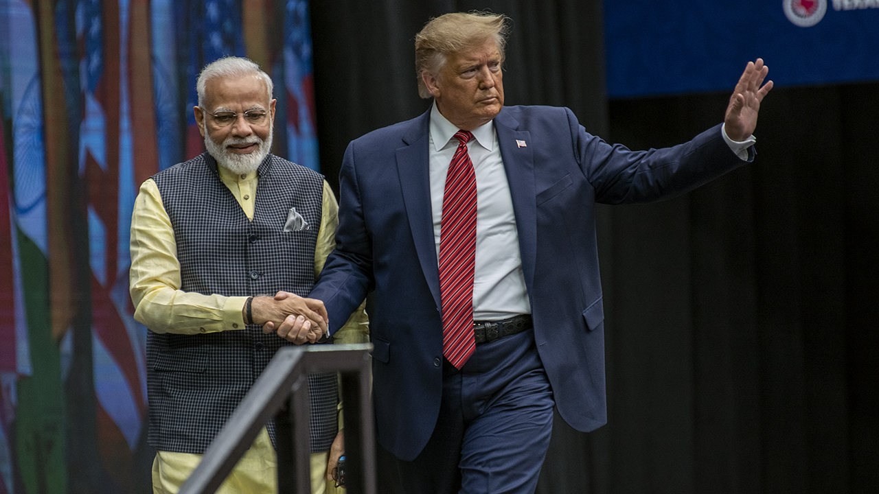 Indian Prime Minster Narendra Modi and President Donald Trump leave the stage at NRG Stadium after a rally in September 2019 in Houston, Texas. (Sergio Flores/Getty Images)