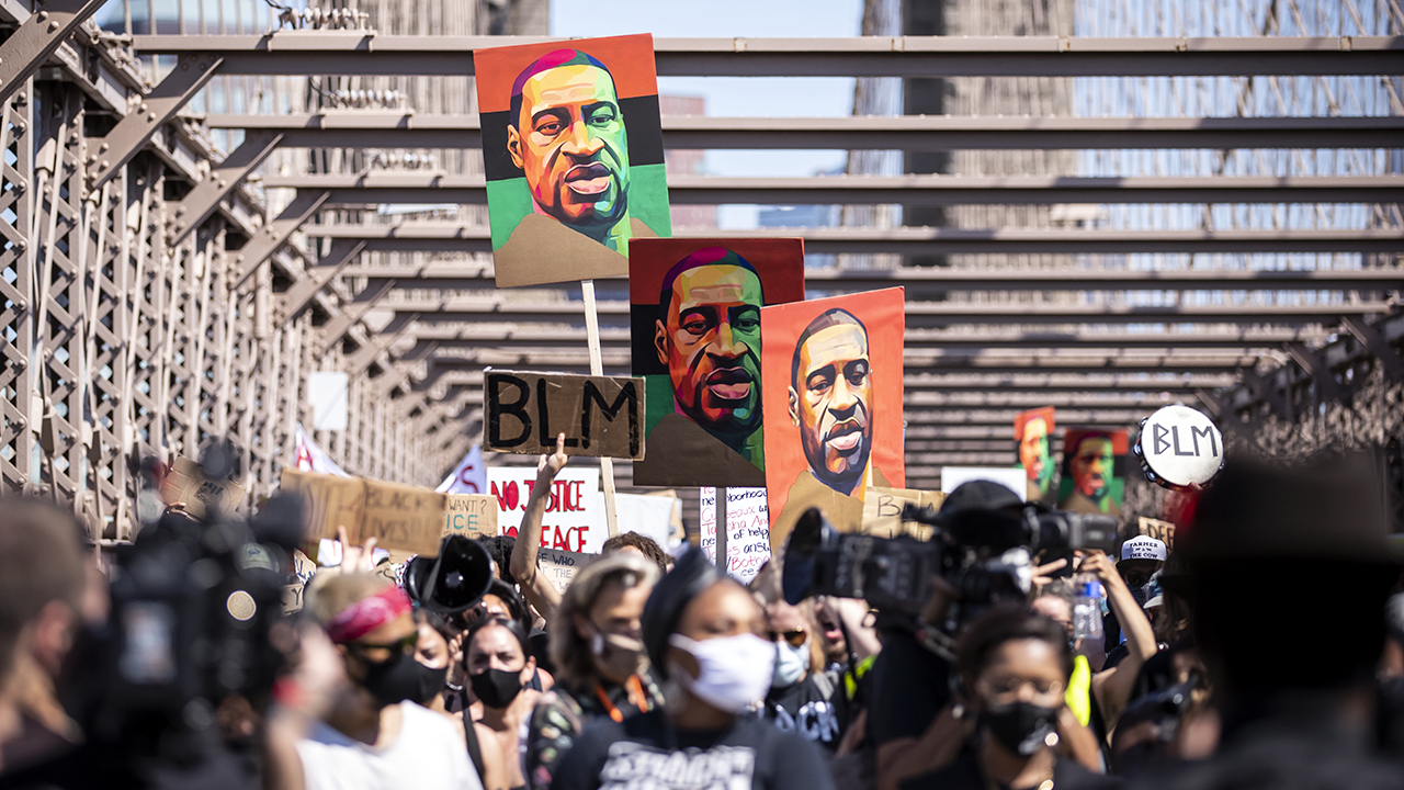 Thousands walk across the Brooklyn Bridge in New York on June 19, 2020, at a protest after the death of George Floyd. (Ira L. Black/Corbis via Getty Images)