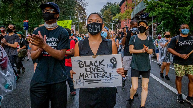 Protesters march in the Brooklyn borough of New York City on Aug. 28, 2020. (Erik McGregor/LightRocket via Getty Images)