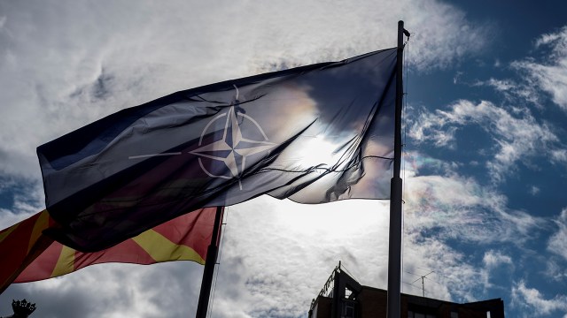 Macedonian and NATO flags wave during the official ceremony of the raising the NATO flag in Skopje on Feb. 12, 2019. (Robert Atanasovski/AFP via Getty Images)