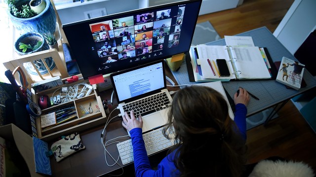 A teacher works from her home due to the coronavirus outbreak on April 1, 2020, in Arlington, Virginia. (Olivier Douliery/AFP via Getty Images)