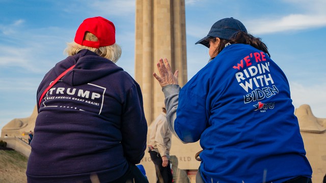 Supporters of Donald Trump and Joe Biden converse before a Biden campaign rally on March 7, 2020 in Kansas City, Missouri. (Kyle Rivas/Getty Images)