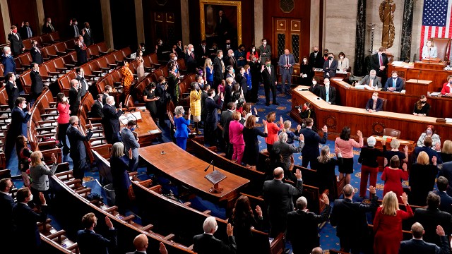 Democratic members of the U.S. House of Representatives are sworn in by Speaker Nancy Pelosi during the first session of the 117th Congress on Jan. 3, 2021. (Erin Scott/POOL/AFP via Getty Images)