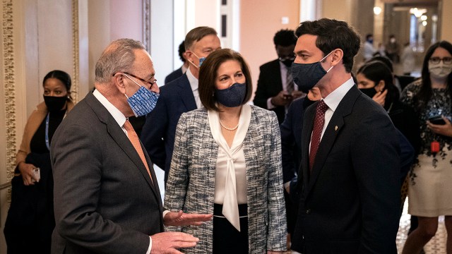 Senate Majority Leader Chuck Schumer speaks with Sens. Catherine Cortez Masto and Jon Ossoff at the U.S. Capitol on Jan. 21, 2021. Ossoff is the first Millennial elected to the Senate. (Drew Angerer/Getty Images)