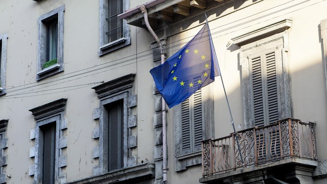 A European Union flag in Milan, Italy, during a nationwide lockdown due to the coronavirus in March 2020. (Mairo Cinquetti/NurPhoto via Getty Images)