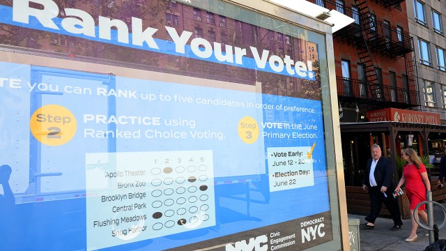 New York City mayoral candidate Kathryn Garcia hands out campaign information while walking with Assembly Member Danny O’Donnell on June 16, 2021, in New York City. The recent Democratic primary for New York City mayor attracted even more attention than usual, as the nation’s biggest city also became the largest jurisdiction to use an alternative voting system known as ranked-choice voting. (Michael M. Santiago/Getty Images)