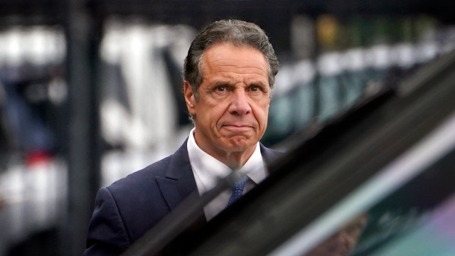 Andrew Cuomo prepares to board a helicopter after announcing his resignation as governor of New York on Aug. 10, 2021.