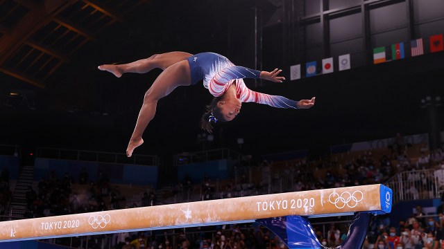 Simone Biles competes in the women's balance beam final in the 2020 Olympic Games on Aug. 3, 2021, in Tokyo.