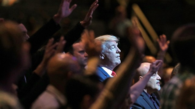 Then-presidential nominee Donald Trump attends a worship service at the International Church of Las Vegas on Oct. 30, 2016, in Las Vegas.