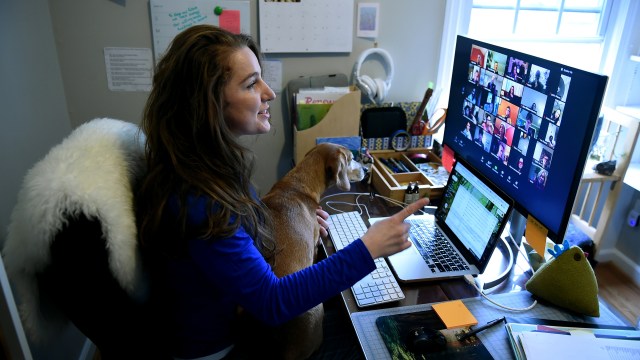 A substitute teacher works from her home in April 2020 during the COVID-19 pandemic.