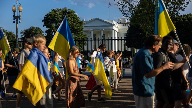 Supporters of Ukraine march in front of the White House in Lafayette Square on August 27, 2022.