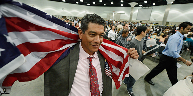 A Mexican-born man celebrates after taking the U.S. oath of citizenship in a naturalization ceremony at the Los Angeles Convention Center. (Kevork Djansezian/Getty Images)